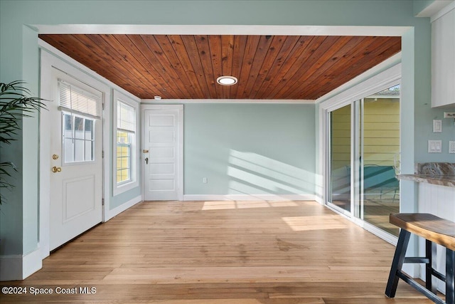 interior space featuring wood ceiling