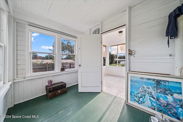 sunroom with wooden ceiling