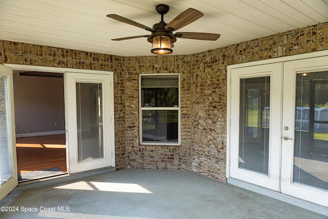 view of patio with french doors and ceiling fan