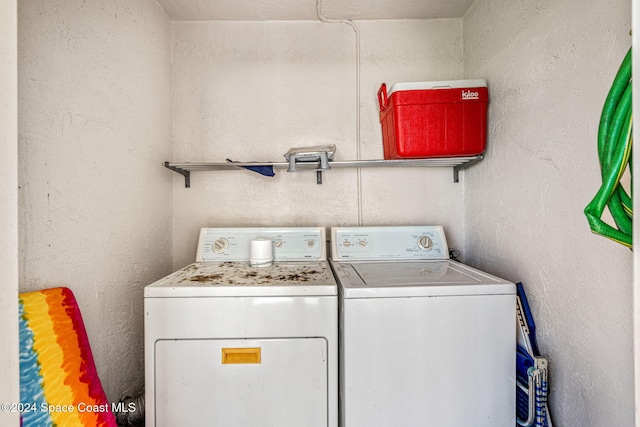 5807 N Atlantic Ave Unit 411, Cape Canaveral, FL 32920 - laundry room featuring laundry area and independent washer and dryer