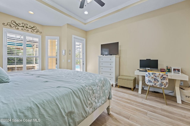 bedroom with ceiling fan and light wood-type flooring