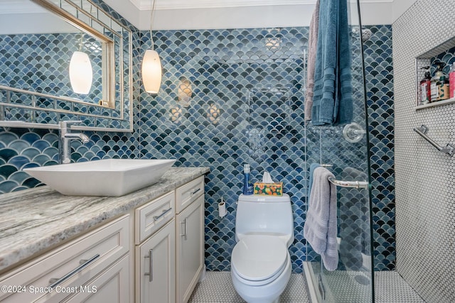 201 International Dr Unit 221, Cape Canaveral, FL 32920 - full bath featuring tile walls, vanity, a shower stall, and tile patterned floors