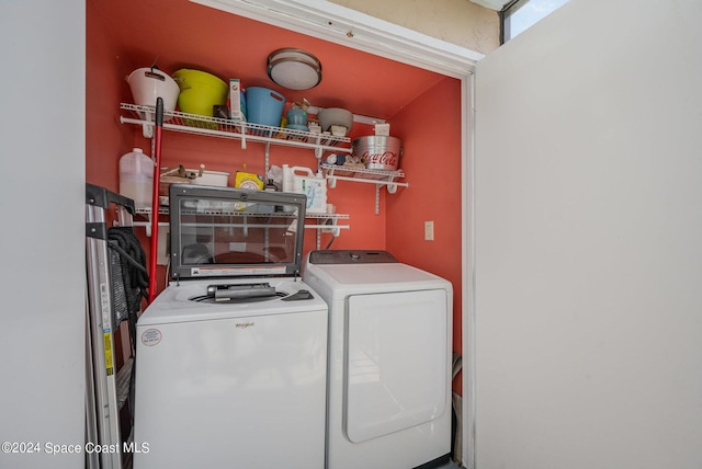 201 International Dr Unit 221, Cape Canaveral, FL 32920 - laundry room with washing machine and dryer