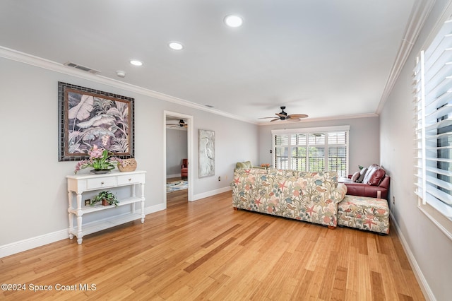 201 International Dr Unit 221, Cape Canaveral, FL 32920 - living area with ceiling fan, recessed lighting, light wood-style floors, and ornamental molding