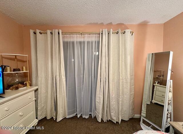 bathroom with vanity and a textured ceiling