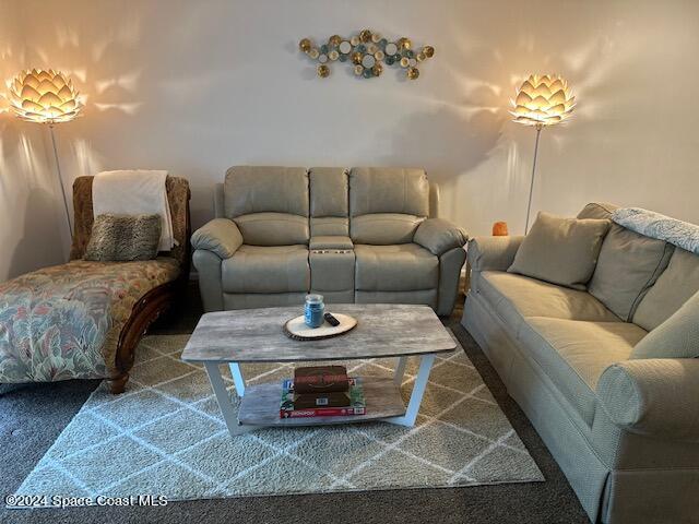 living room featuring carpet floors