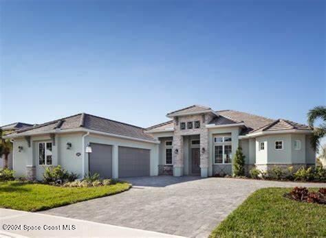 prairie-style home featuring a garage