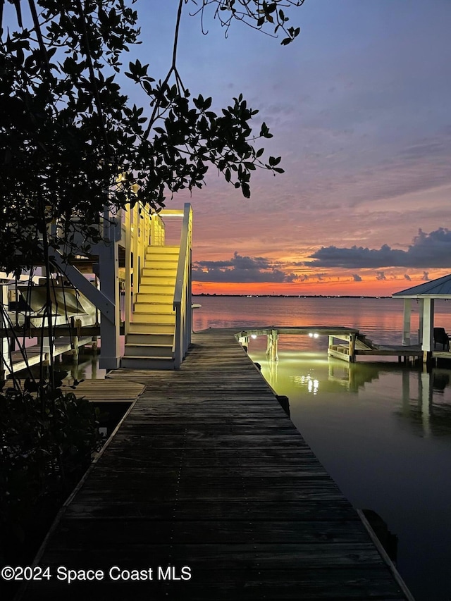 view of dock with a water view