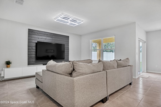 living room featuring light tile patterned floors