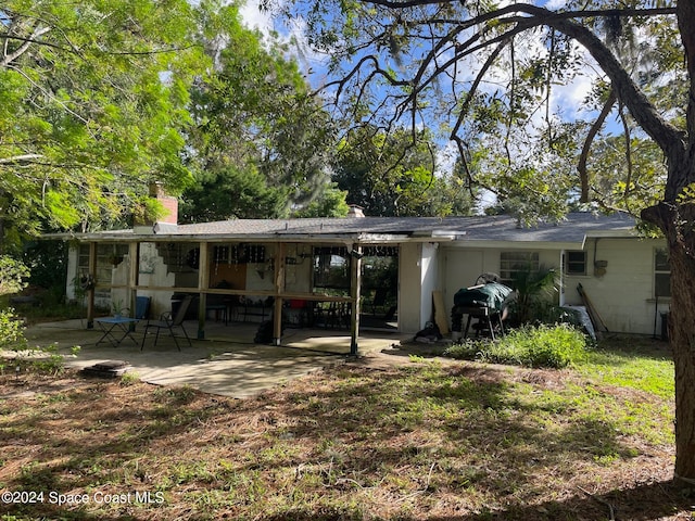 back of house featuring a patio