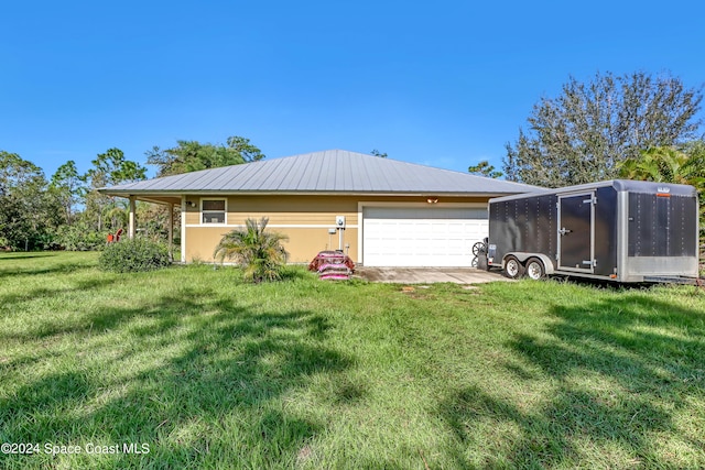 garage with a lawn