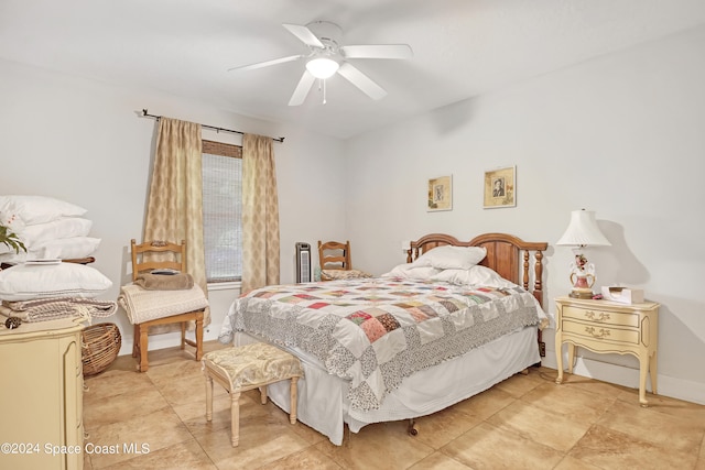 bedroom featuring ceiling fan