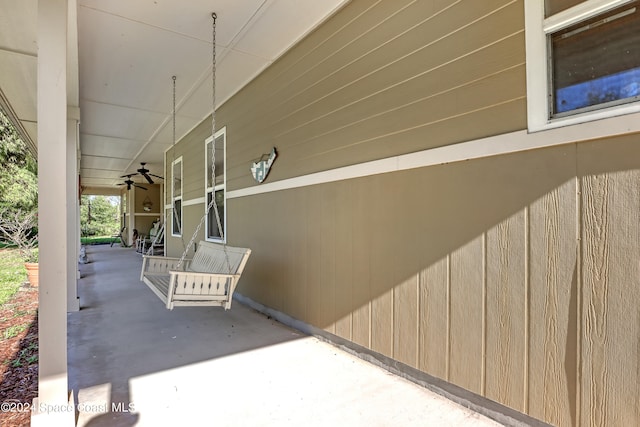 view of patio featuring ceiling fan