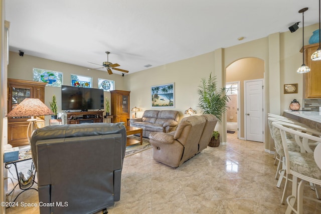 living room featuring ceiling fan