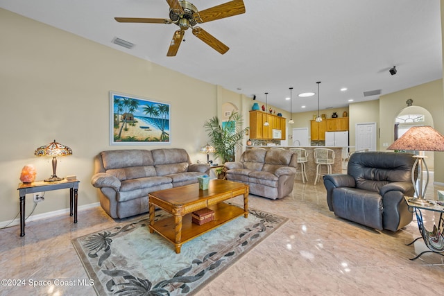 living room featuring ceiling fan