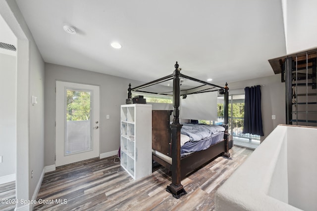 bedroom featuring hardwood / wood-style flooring