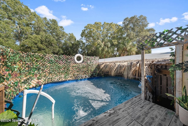 view of pool with a pergola