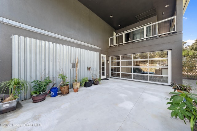 view of patio with a balcony