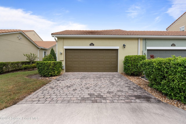 view of front of home featuring a garage