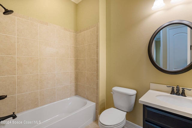 full bathroom with toilet, tiled shower / bath combo, and vanity