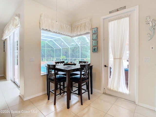 dining room with light tile patterned flooring