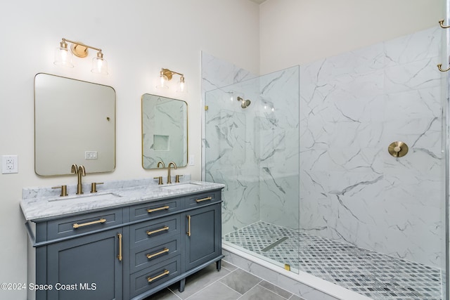 bathroom featuring vanity and a tile shower