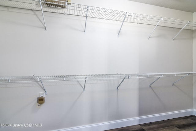 480 Prestwick Ct, Melbourne, FL 32940 - walk in closet featuring wood finished floors