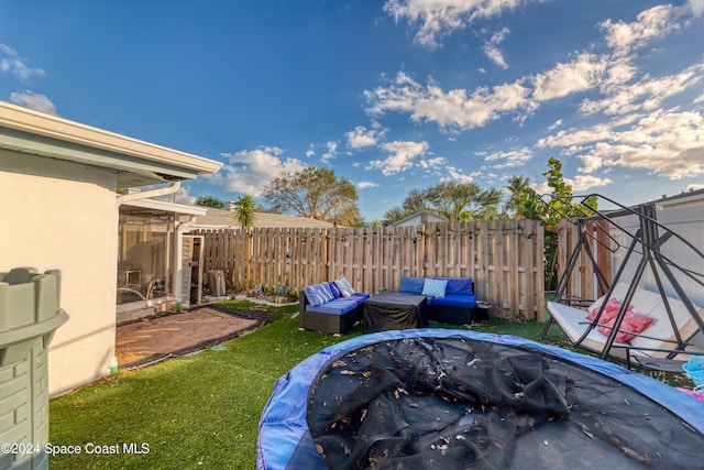 view of yard featuring a trampoline