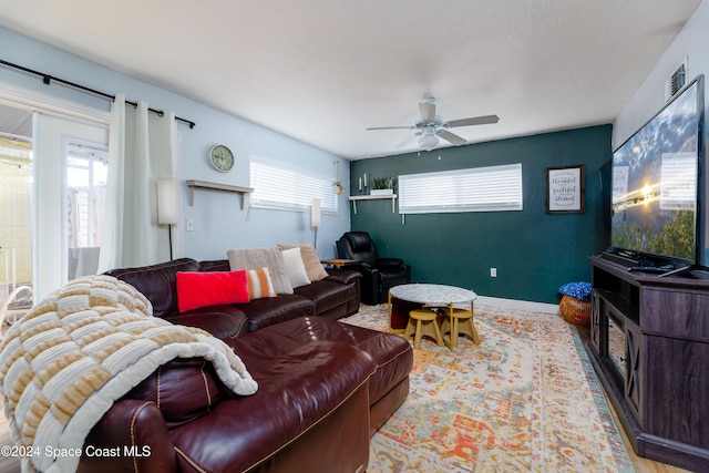 living room with ceiling fan