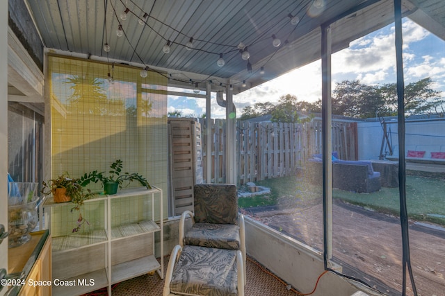 sunroom / solarium featuring a healthy amount of sunlight