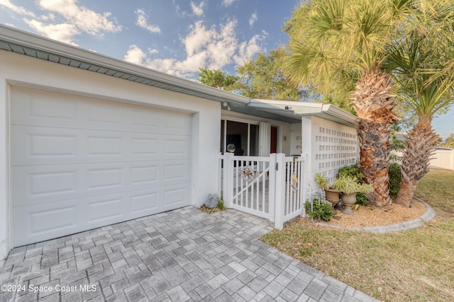 view of front of home with a garage