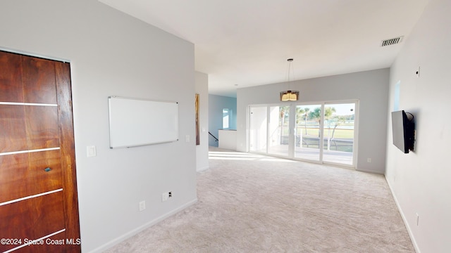 view of carpeted spare room