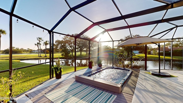 exterior space featuring a water view and vaulted ceiling