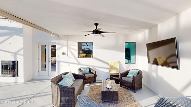 living room with french doors and ceiling fan