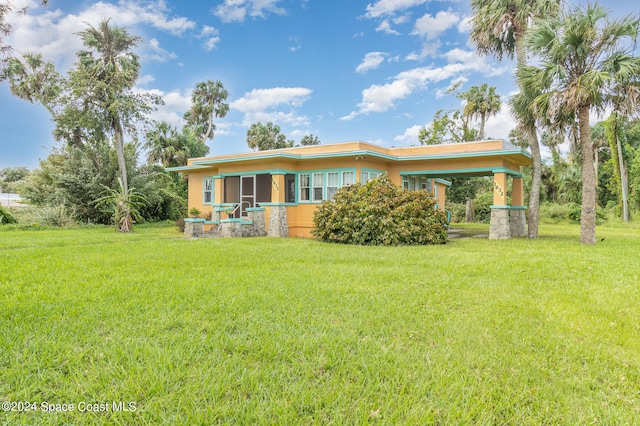 exterior space featuring a front lawn