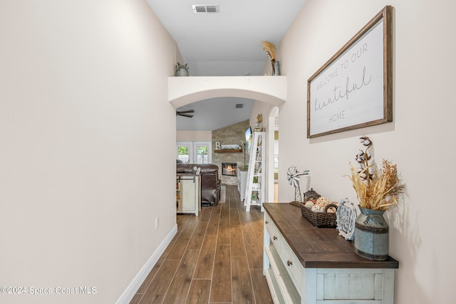 hallway with dark wood-type flooring