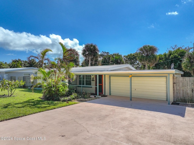 185 Richards Rd, Melbourne Beach, FL 32951 - single story home featuring a garage and concrete driveway