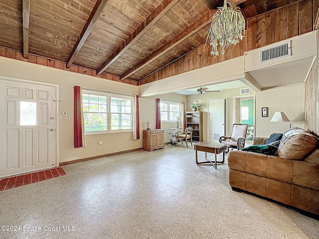 unfurnished living room with wooden ceiling, vaulted ceiling with beams, and ceiling fan with notable chandelier