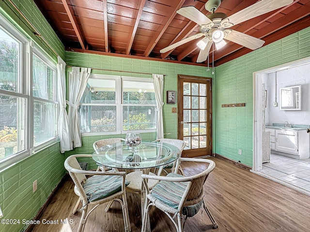 185 Richards Rd, Melbourne Beach, FL 32951 - sunroom / solarium with wood finished floors, ceiling fan, outdoor dining space, and wooden ceiling with exposed beams