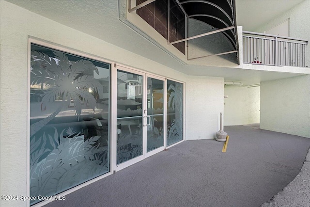 view of patio with a balcony