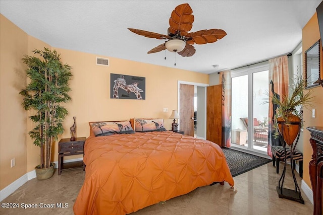 bedroom featuring ceiling fan and access to outside