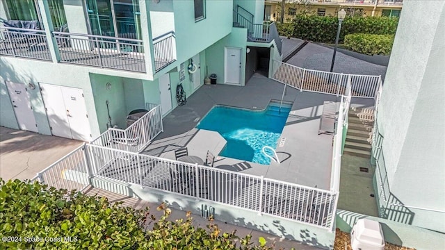 view of pool featuring a patio