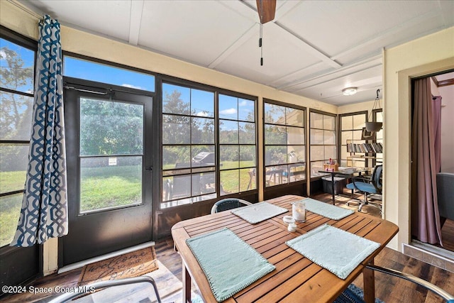 sunroom / solarium with ceiling fan and a wealth of natural light