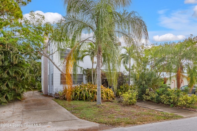415 Audubon Dr, Melbourne, FL 32901 - view of property exterior with concrete driveway