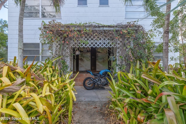 property entrance featuring french doors