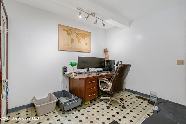 office space with beamed ceiling