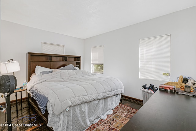 bedroom featuring dark hardwood / wood-style floors