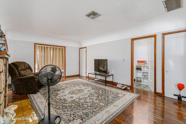 415 Audubon Dr, Melbourne, FL 32901 - living room featuring hardwood / wood-style flooring and baseboards