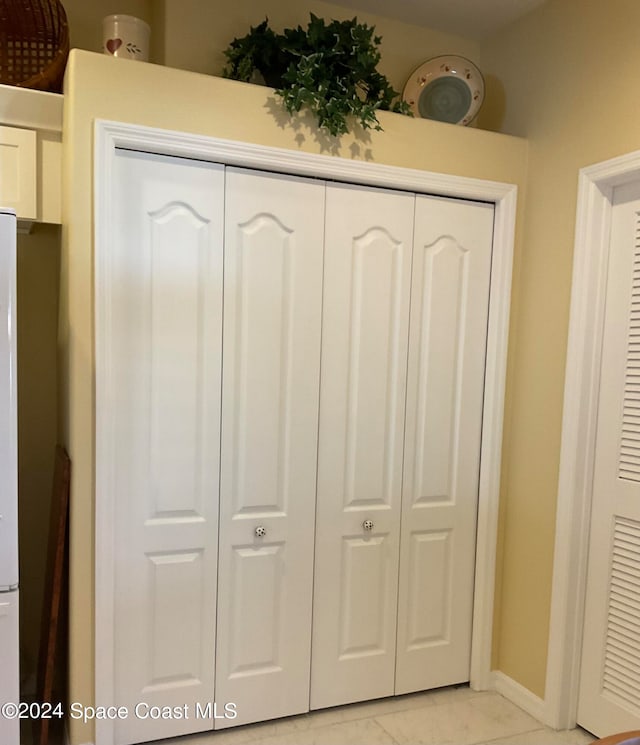 interior details featuring tile patterned flooring