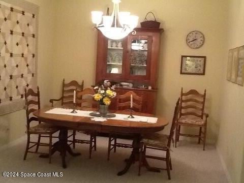 dining room with an inviting chandelier